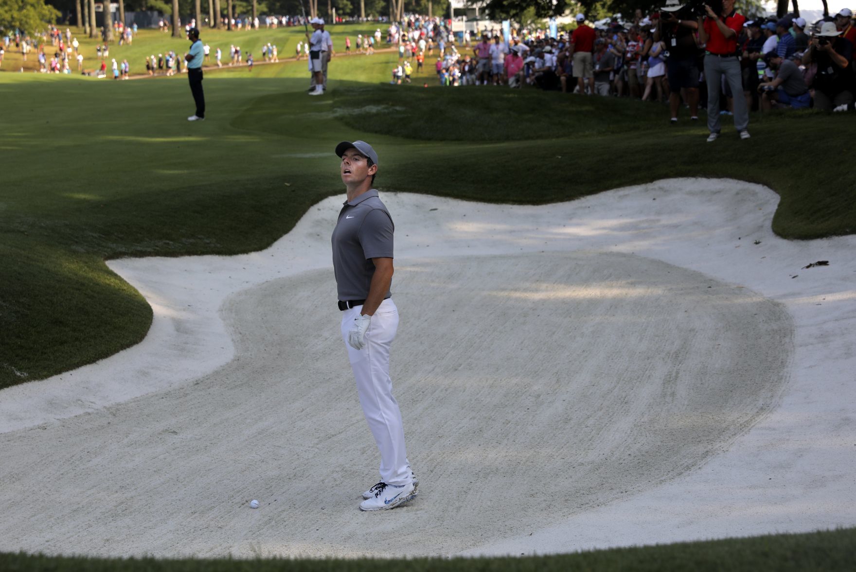Rain-delayed second round continues of the 100th PGA Championship